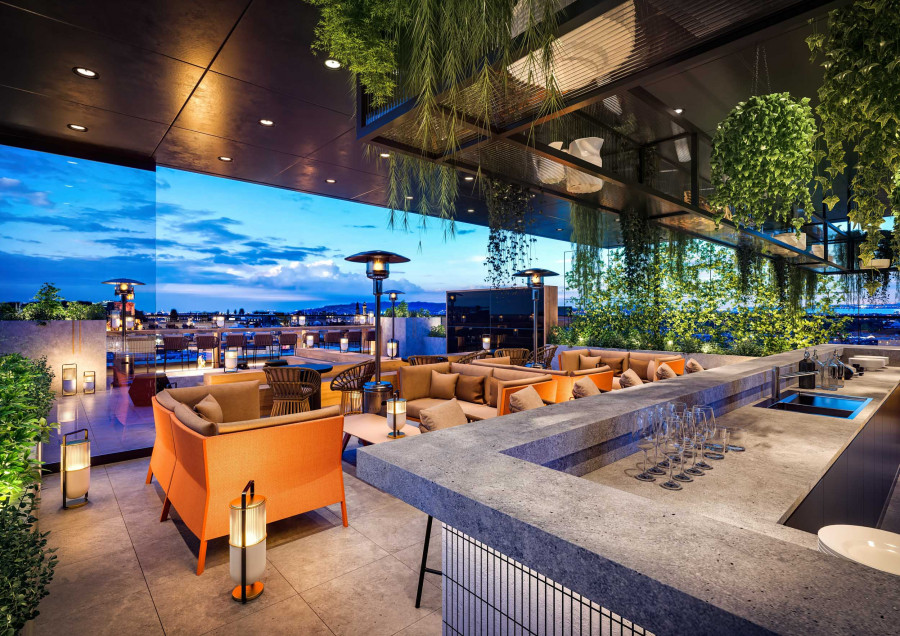 Visualization of a rooftop lounge with soft seating, a stone bar counter, hanging greenery, and panoramic city views at sunset.
