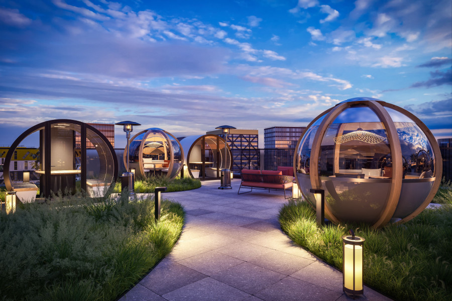 Visualization of a landscaped rooftop with circular glass dining pods, pathway lighting, and panoramic city views.