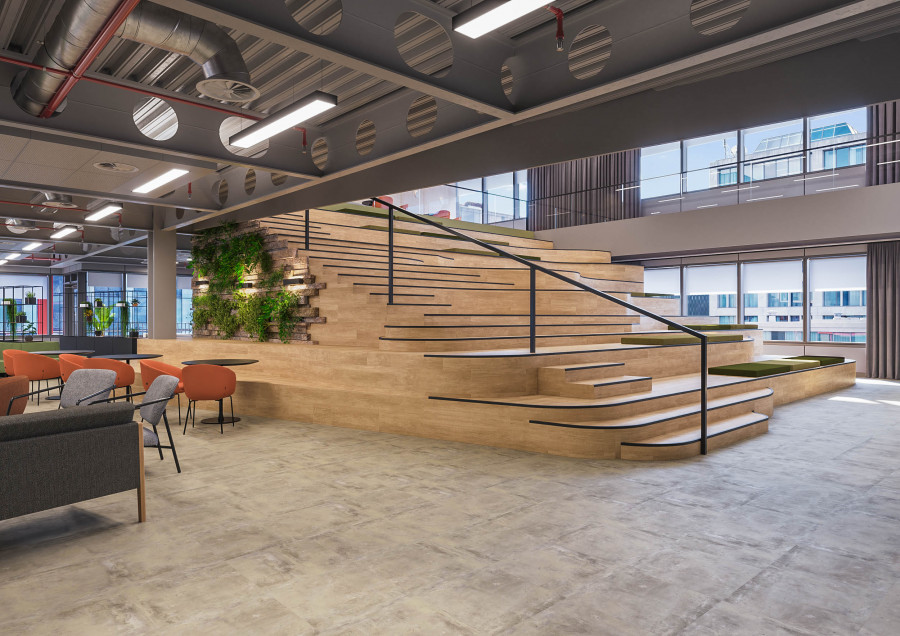 3D render of a spacious office breakout area with wooden staircase and seating by Visioaxis.