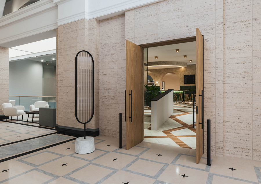 CGI of the Federated Hermes lobby by Oktra, showcasing natural textures, stone finishes, and contemporary detailing within a listed building