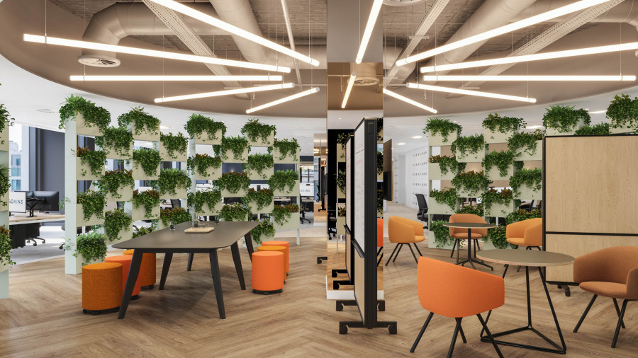 Architectural CGI of a collaborative zone. Focuses on complex reflections rendered in a mirrored structural column alongside vibrant furniture materials.